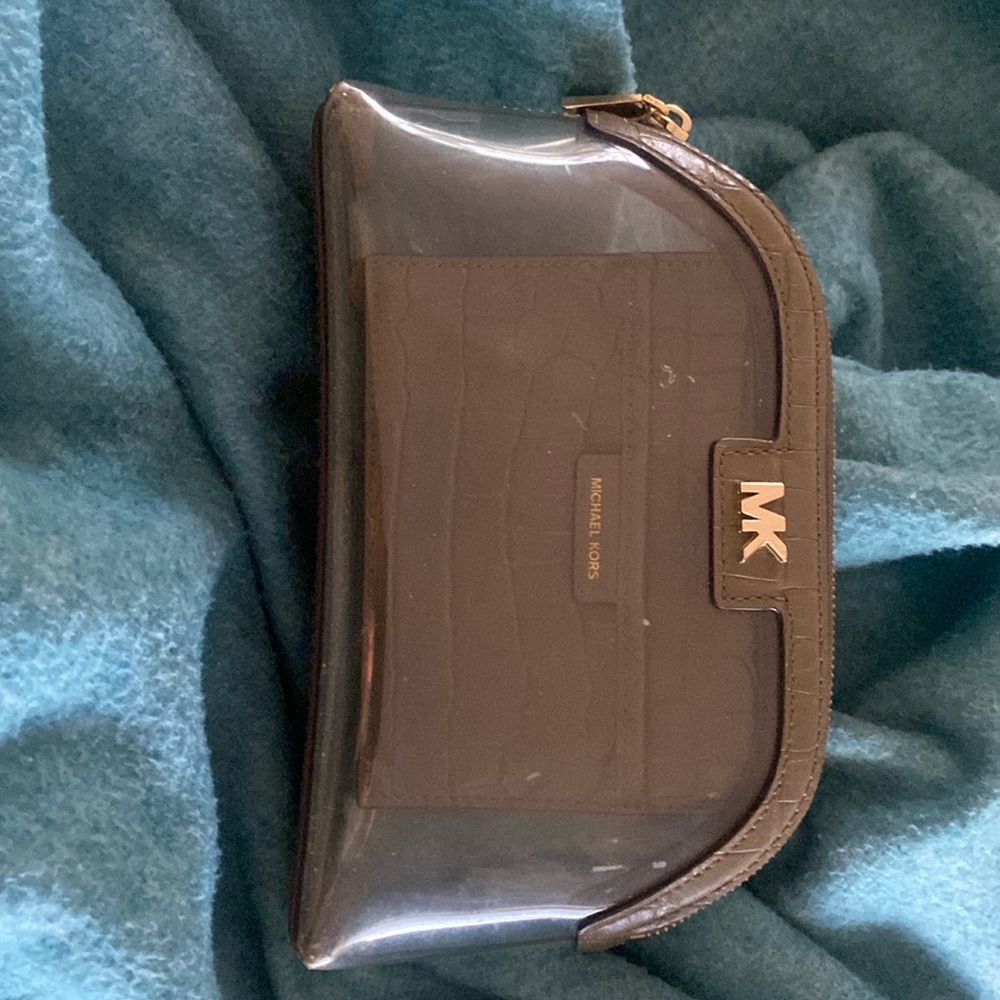 Olive green Michael Kori’s zipper clear clutch